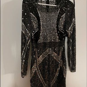 Adorable heavy beaded dress.